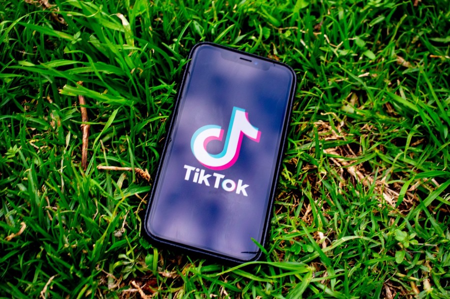 Phone with Tik-Tok logo on the ground