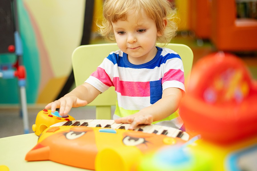 Boy playing a music